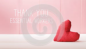 Thank You Essential Workers message with a red heart cushion