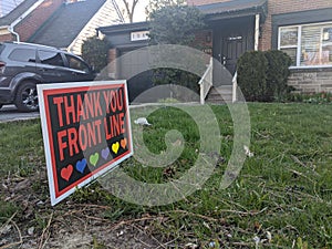 Thank you front line, essential workers & volunteers sign in front of a house during corona virus pandemic outbreak