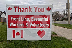 Thank you front line, essential workers & volunteers sign in front of a house during corona virus pandemic outbreak