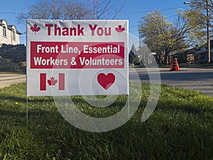 Thank you front line, essential workers & volunteers sign in front of a house during corona virus pandemic outbreak