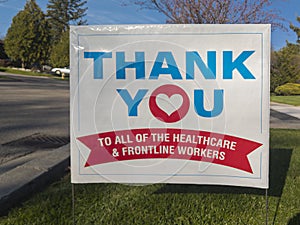 Thank you front line, essential workers & volunteers sign in front of a house during corona virus pandemic outbreak