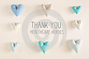 Thank You Healthcare Heroes message with blue heart cushions