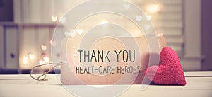 Thank You Healthcare Heroes message with a red heart photo