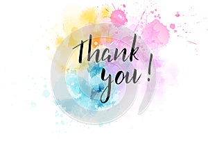 Thank you lettering on watercolored background