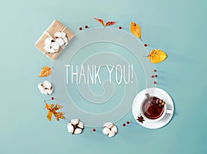 Thank you message with autumn leaves and tea