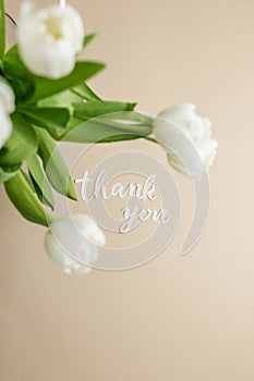 Thank you message for card, presentation, business with white tulips on beige