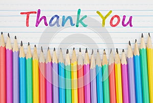 Thank You message with color pencils on vintage ruled line notebook paper