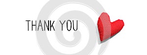 Thank you message with a red heart cushion