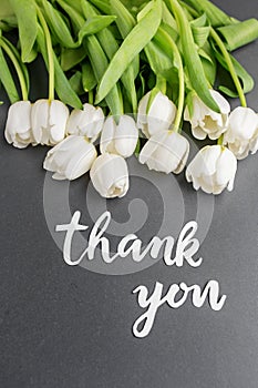 Thank You Message with White Tulips on Grey. Vertical