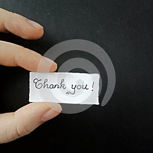 Thank you note, handwritten tiny mesage, handwriting paper note. photo