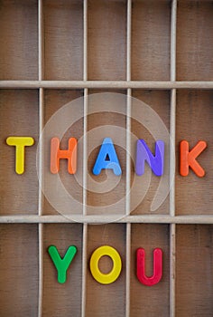 Thank you text letters in a vintage letter case