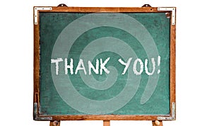 Thank you! text message in white chalk letters written on a school green old grungy vintage wooden chalkboard or blackboard frame