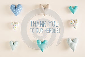 Thank You to Our Heroes message with blue heart cushions