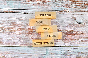Thank you for your attention concept. Text written on wooden blocks on old boards. Business concept