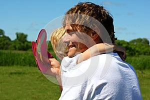 Thankful Father Hugs Child