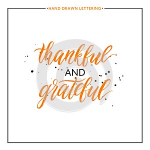 Thankful and grateful lettering with black splashes photo