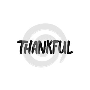 Thankful - hand drawn Autumn seasons Thanksgiving holiday lettering phrase isolated on the white background. Fun brush