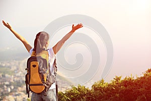 Thankful hiking woman seaside mountain