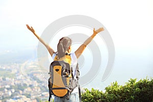 Thankful hiking woman seaside mountain