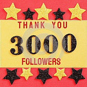 Thanks 3000, 3K, followers. message with black shiny numbers on red and gold background with black and golden shiny stars