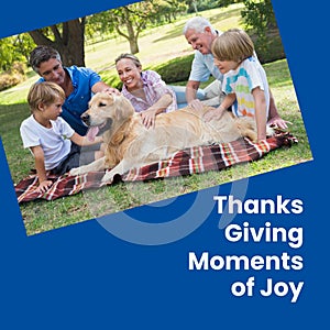 Thanks giving moments of joy text on blue with caucasian family and pet dog in garden