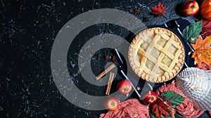 Thanksgiving apple and pumpkin pies on dark marble table stop motion animation.