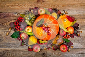 Thanksgiving arrangement with pumpkins, apples, pears, colorful