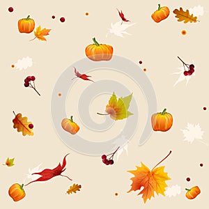 Thanksgiving autumn background with maple leaves with red berries and orange pumpkins