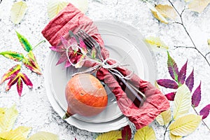 Thanksgiving autumn place setting with cutlery