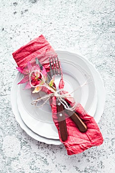 Thanksgiving autumn place setting with cutlery