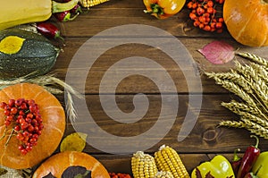 Thanksgiving autumn still life of vegetables with copy space on a dark wooden background and on burlap