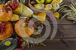 Thanksgiving autumn still life of vegetables with copy space on a dark wooden background and on burlap