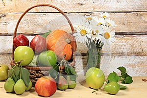 Thanksgiving background, harvest concept, autumn composition with fruits, natural berries, pumpkins, pears, apples, flowers on a
