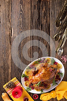 Thanksgiving chicken on wooden table gala dinner, top view