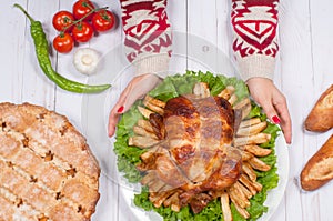 Thanksgiving or Christmas. Homemade roasted whole turkey on wooden table. Thanksgiving Celebration Traditional Dinner Setting