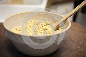 Thanksgiving Cornbread Dressing Preparation in Antique Stoneware Mixing Bowl