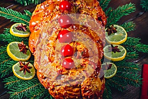 Thanksgiving day. Christmas table dinner time with roasted meats decorated in Christmas style. The concept of a family holiday