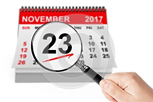 Thanksgiving Day Concept. 23 November 2017 calendar with magnifier