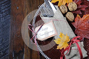 Thanksgiving dining table place setting in traditional rustic country style with copy space.