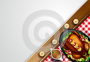 Thanksgiving dinner background with turkey and all sides dishes, pumpkin pie, fall leaves and seasonal autumnal decor on wooden