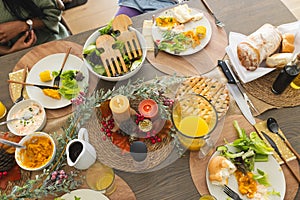 Thanksgiving dinner celebrating by african american parents, children and grandparents