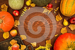 Thanksgiving dinner. Fruit and vegetables with plate on wooden table. Thanksgiving autumn background. Flat lay, top view