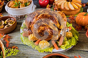 Thanksgiving dinner with turkey, apple pie, pumpkin