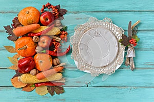 Autumn table setting, menu composition, vintage cutlery, sliced pumpkin.