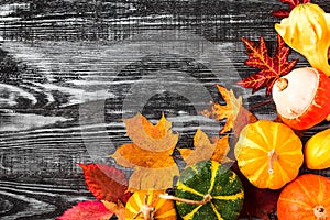 Thanksgiving or Halloween background. Festive autumn composition with pumpkins and leaves