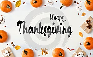 Thanksgiving message with autumn pumpkins with present boxes