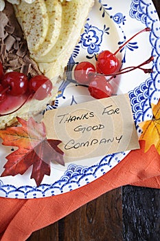 Thanksgiving pie on dark wood closeup - vertical.