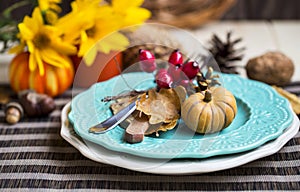 Thanksgiving setting table decoration with cutlery ,plates and a