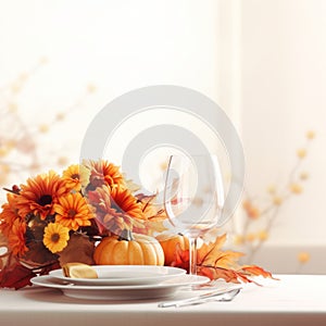 thanksgiving table setting with autumn flowers and pumpkins