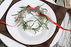 Thanksgiving Table Setting with Rosemary Wreath